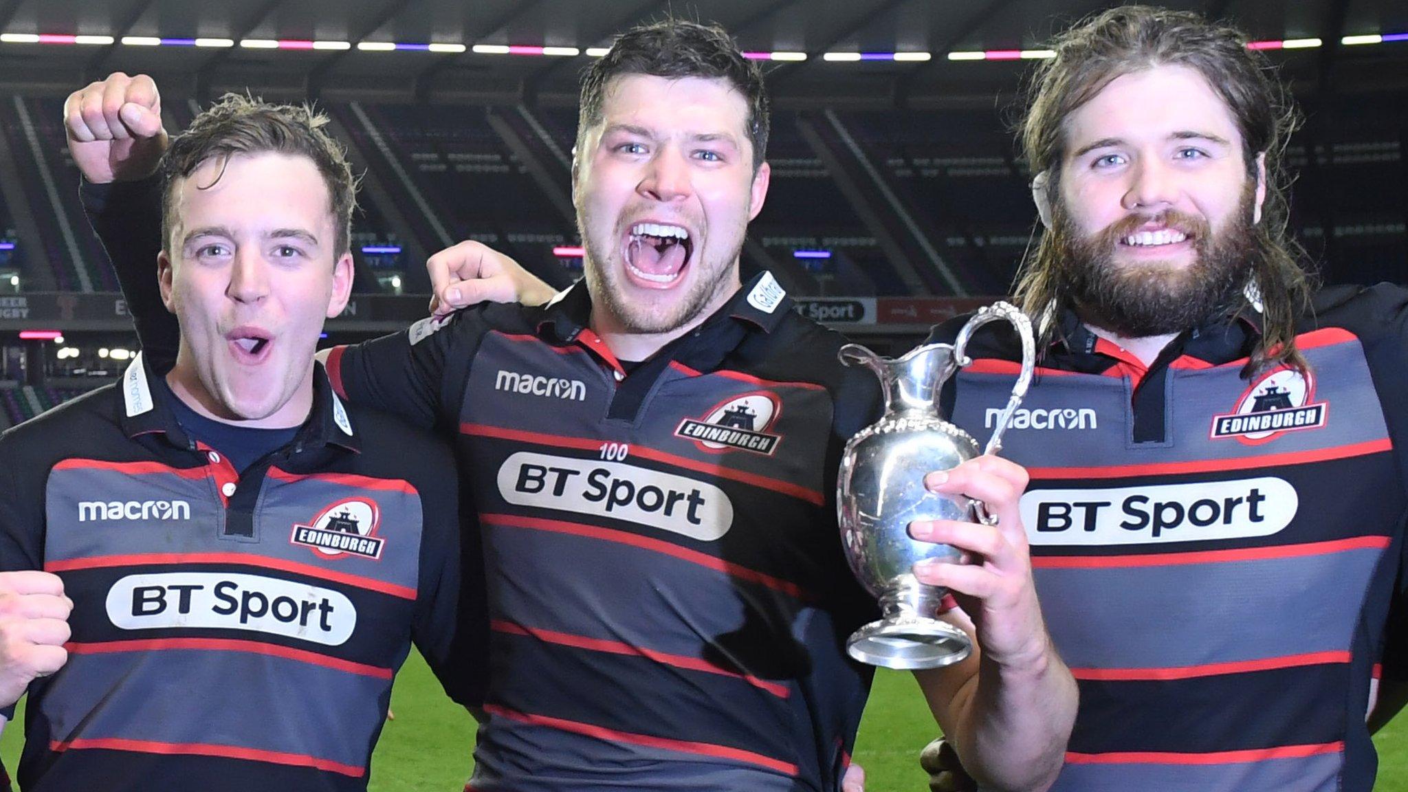 Edinburgh players celebrate with the 1872 Cup