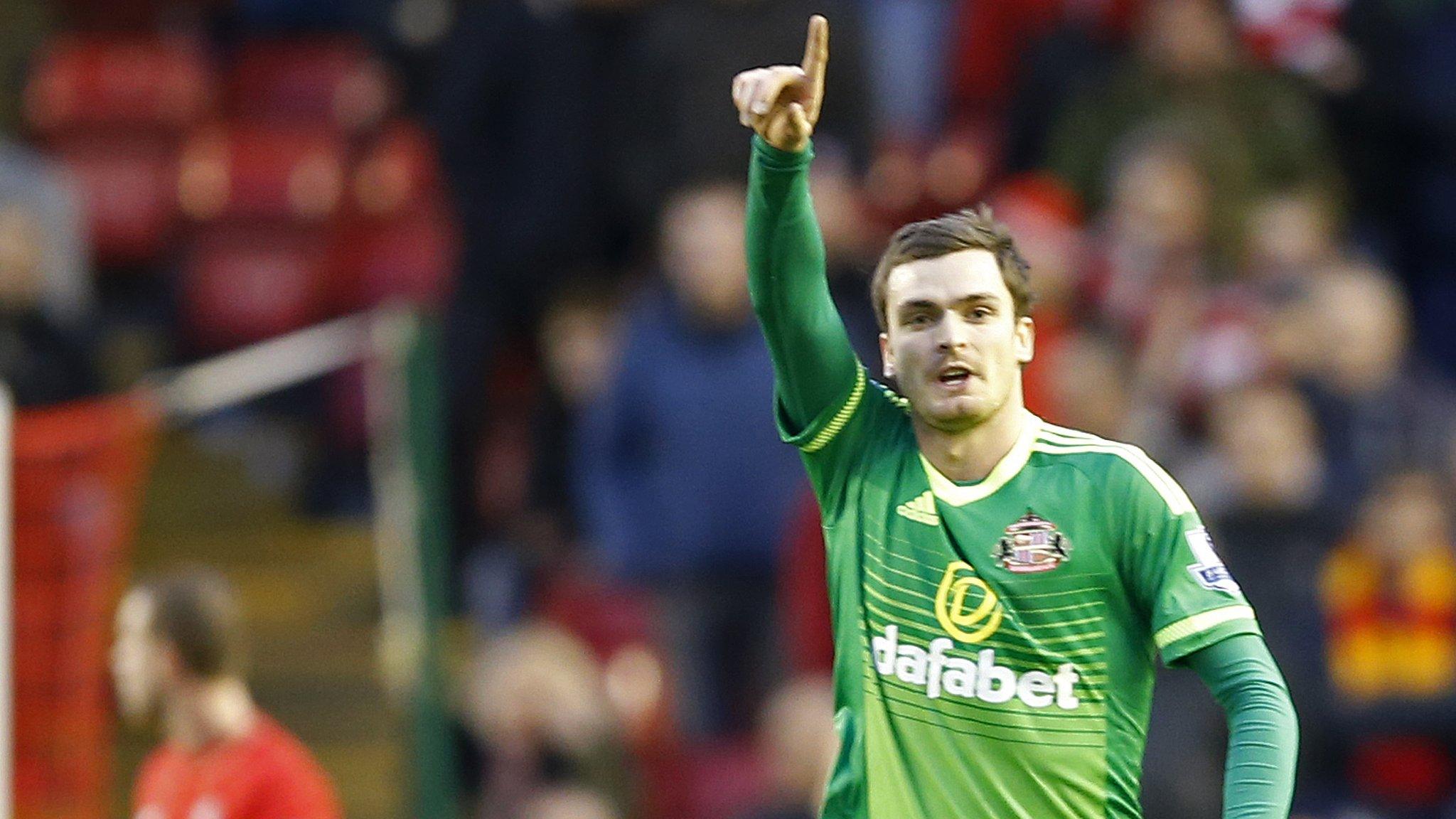 Adam Johnson celebrates