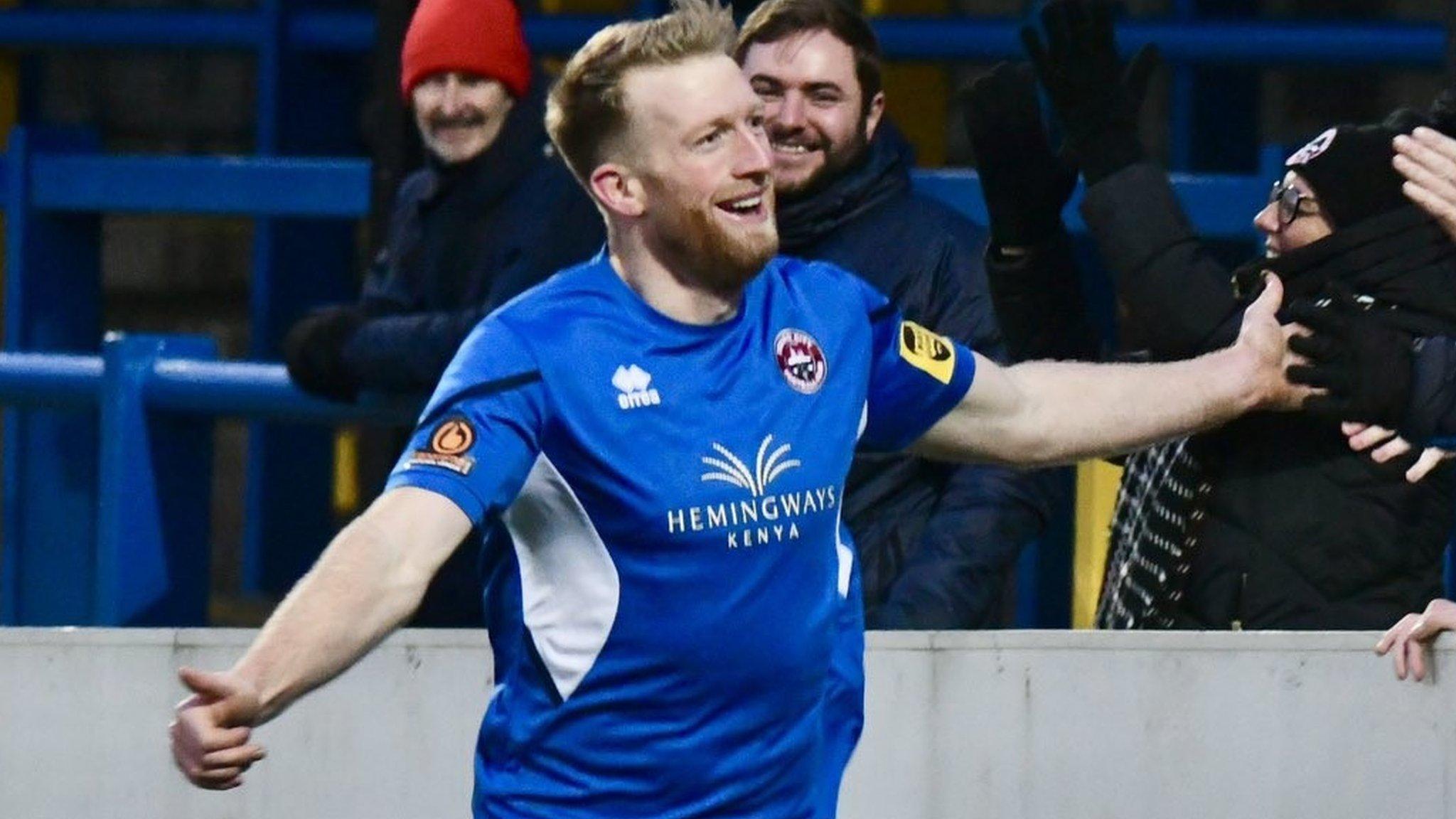 Ed Palmer celebrates scoring