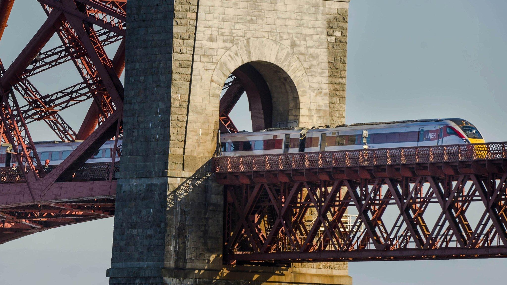 Hitachi Class 800 train crosses the Forth Bridge in Edinburgh