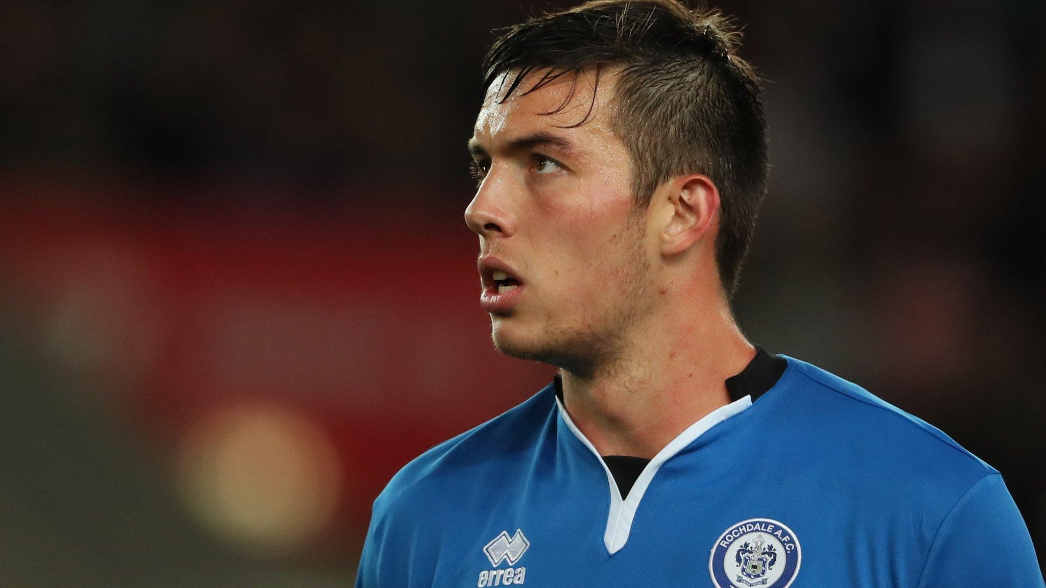 Niall Canavan in action for Rochdale