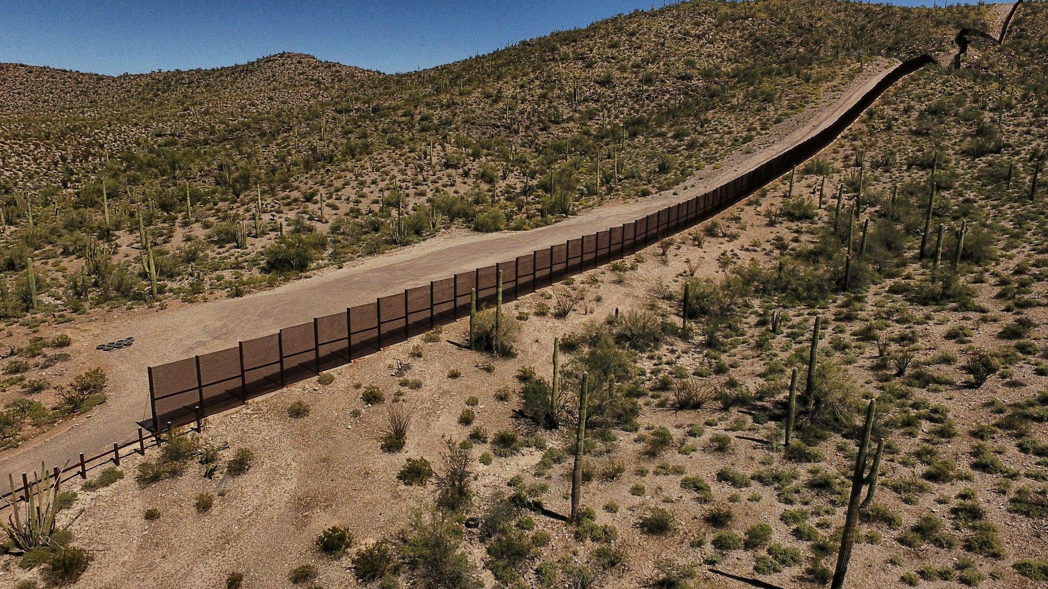 A border fence between Mexico and the US state of Arizona