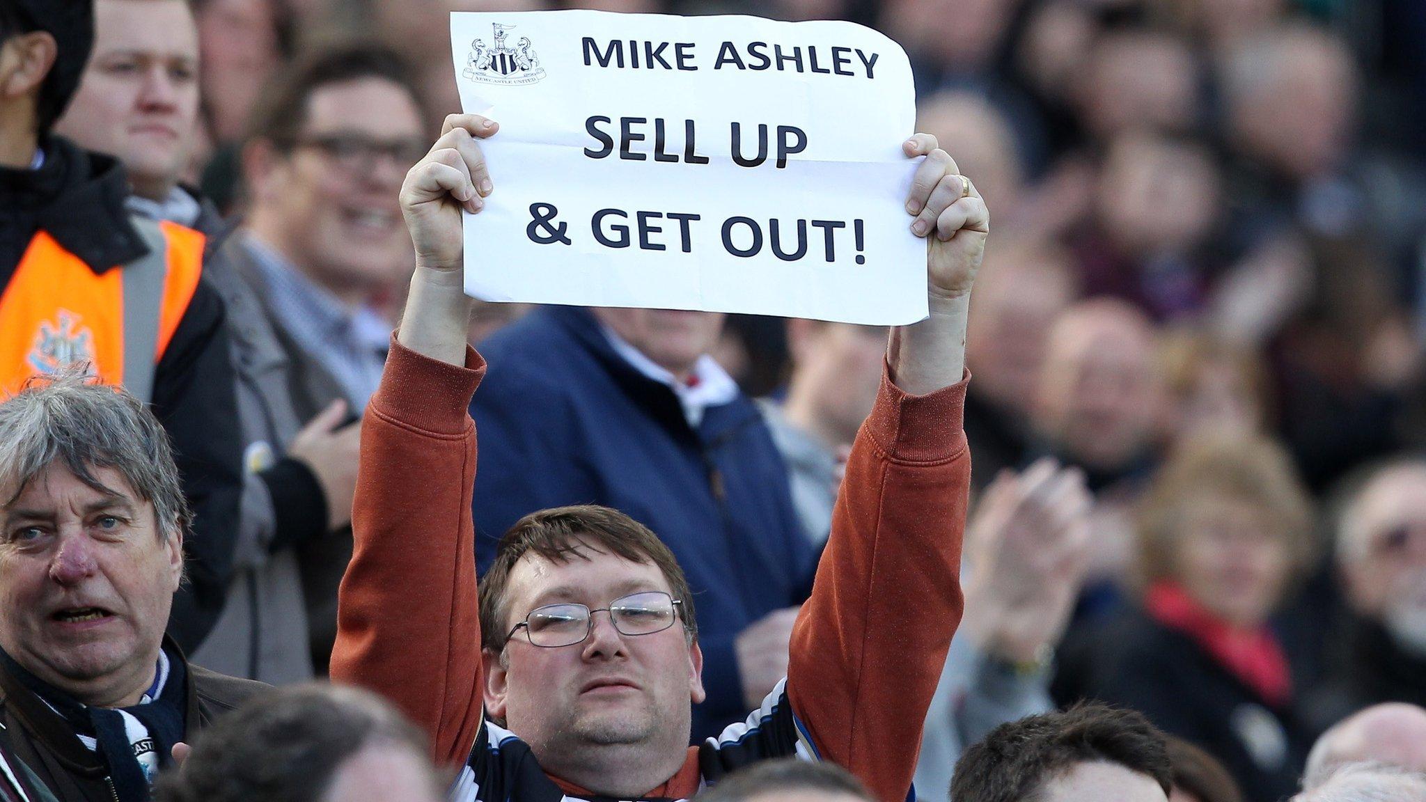 Newcastle fan protests against Mike Ashley