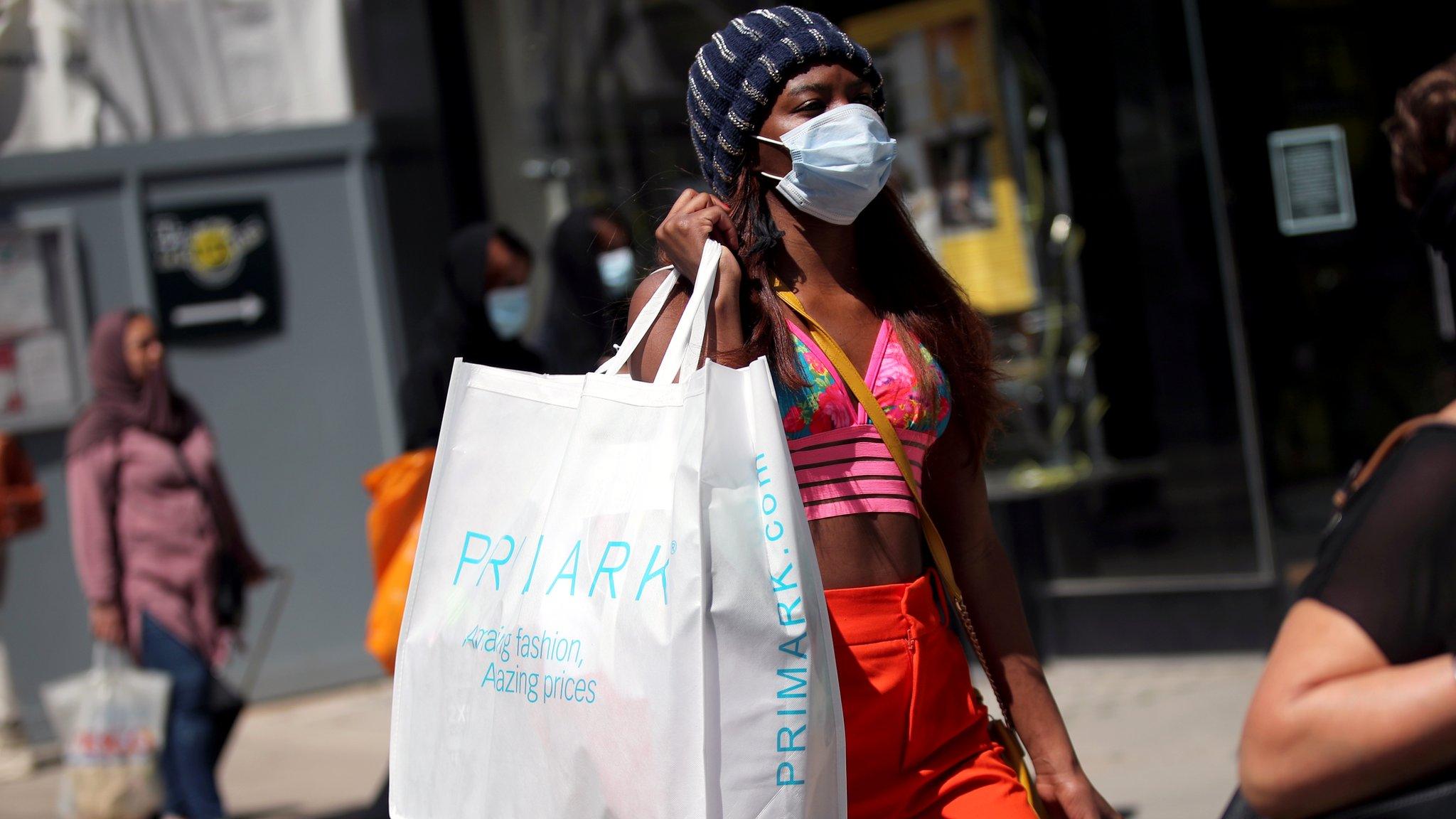 Woman with Primark bag