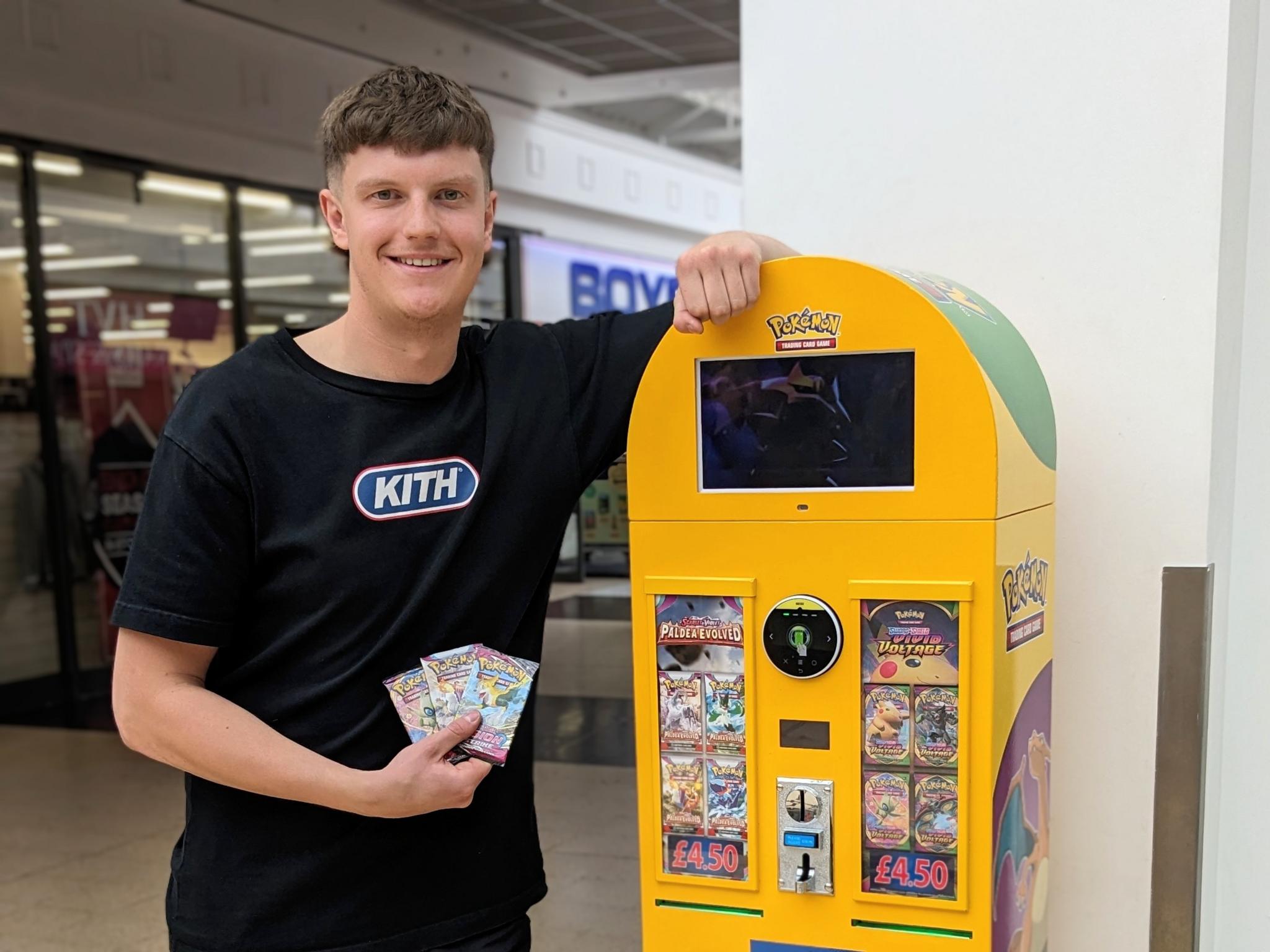 Alex Harrison with Pokémon vending machine