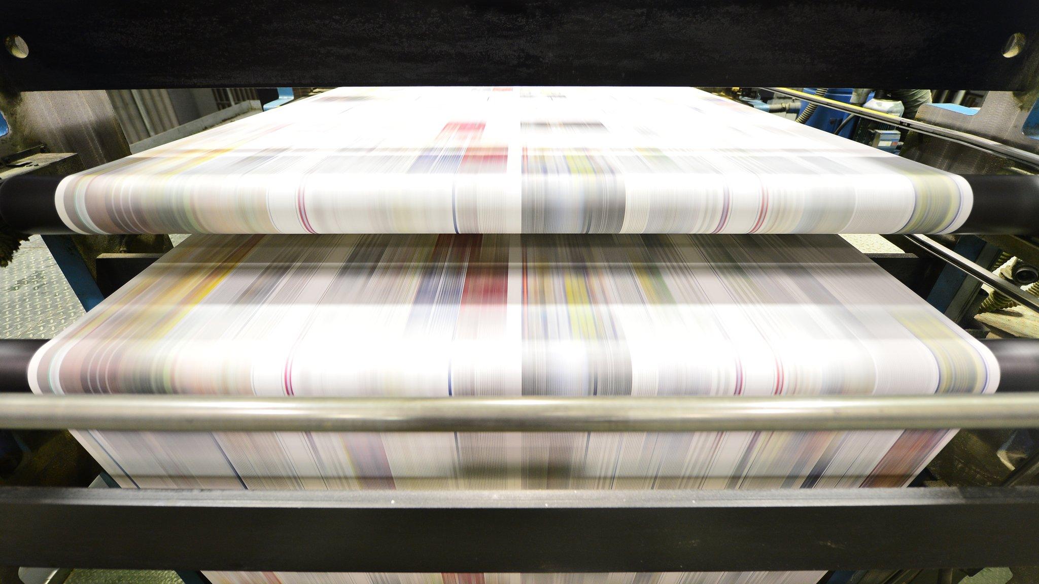 Newspapers being printed