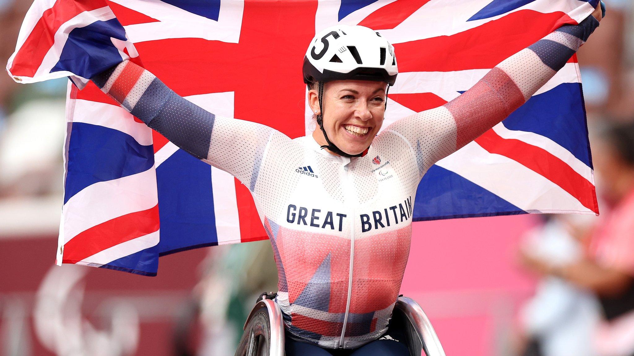 Hannah Cockroft celebrates one of her Tokyo gold medals