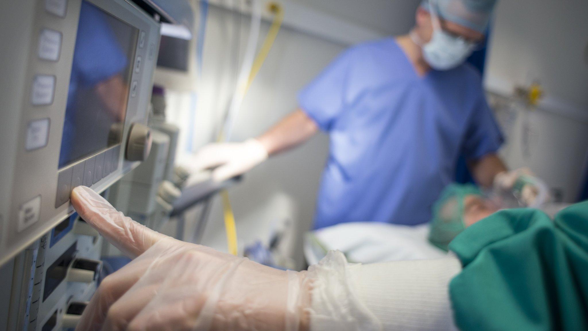 Surgeons in an operating theatre