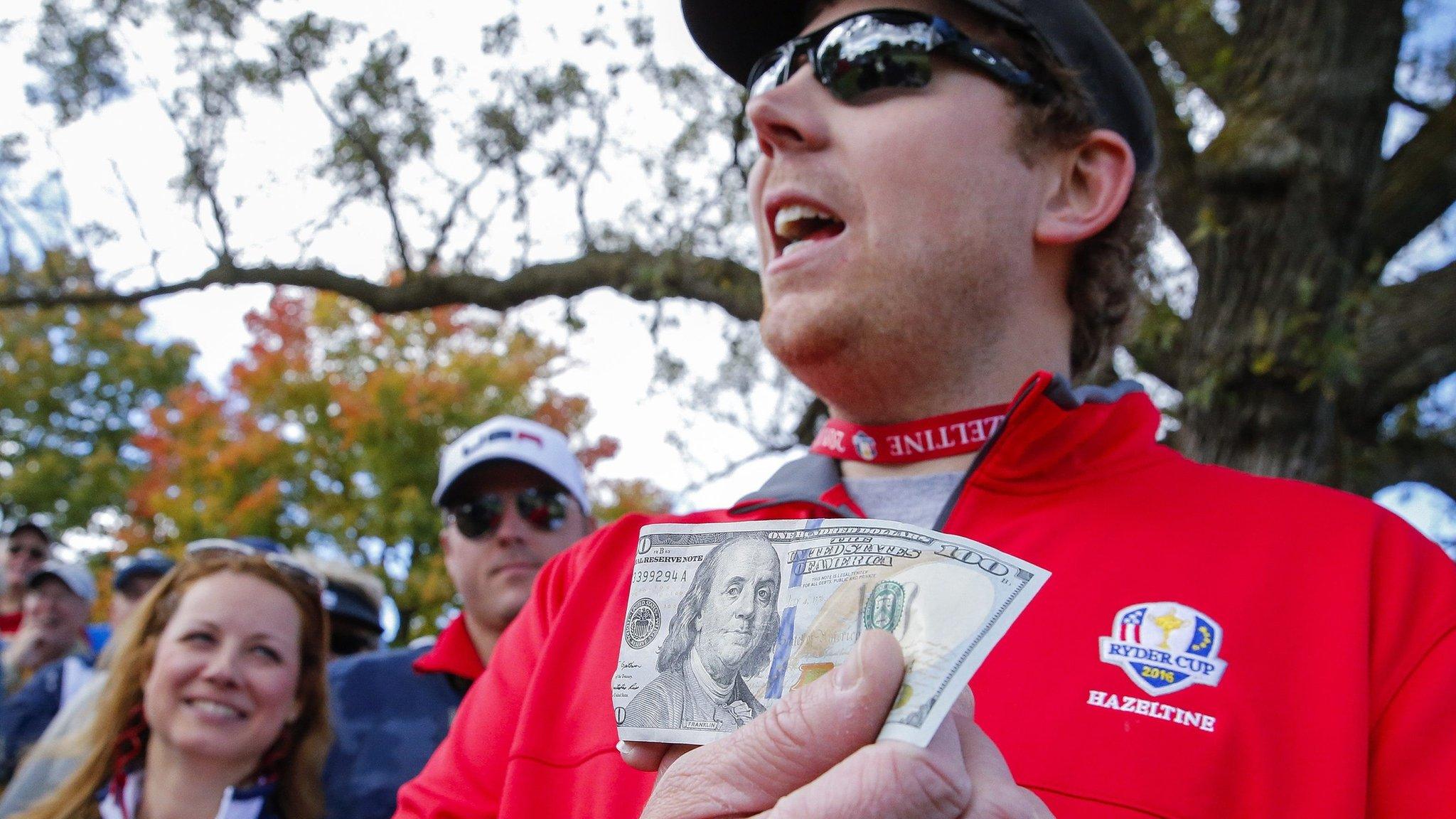 American heckler with $100