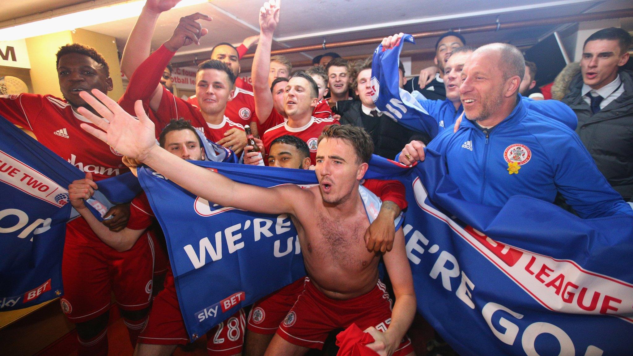 Accrington Stanley celebrate promotion in the changing rooms after beating Yeovil Town 2-0