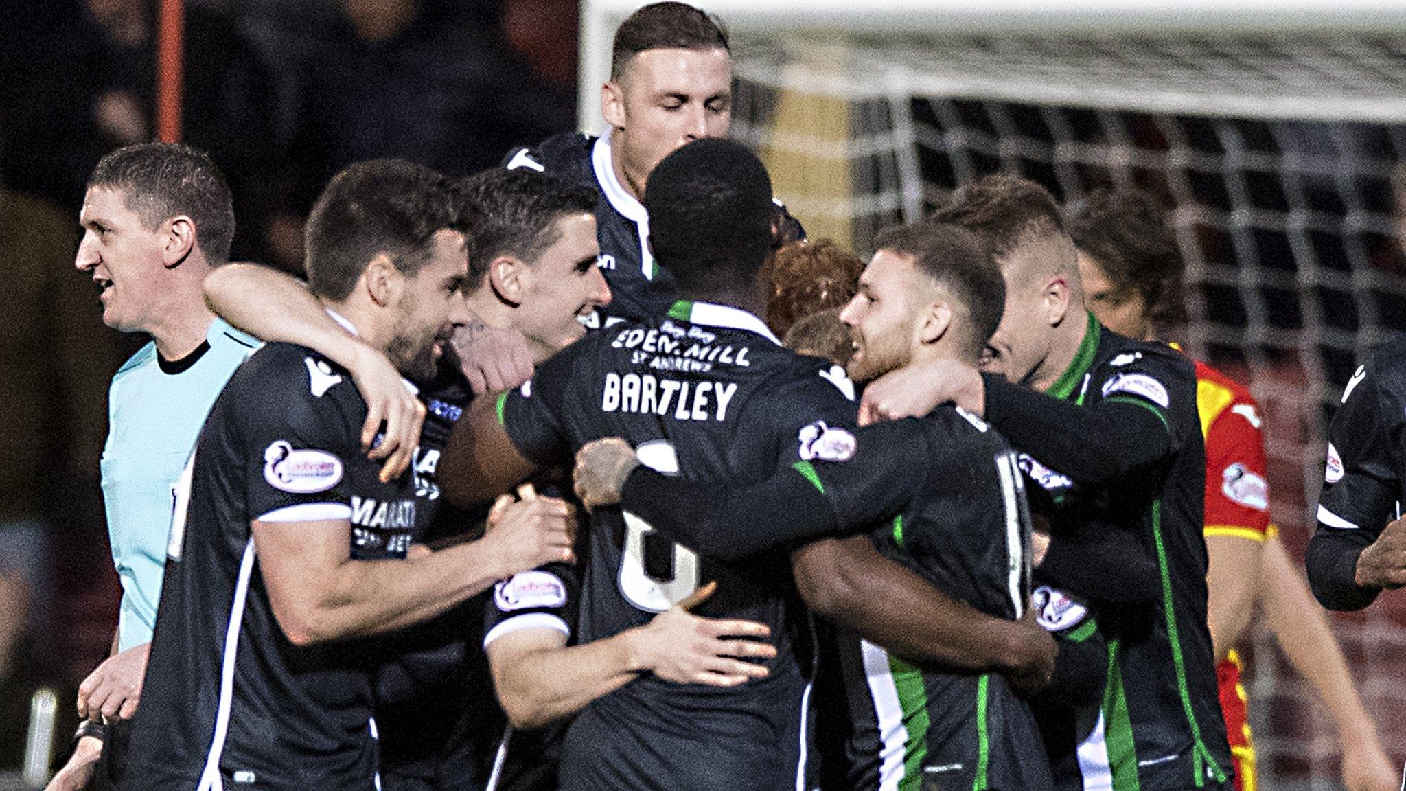 Hibernian players celebrate after Partick Thistle's Adam Barton scores an own goal