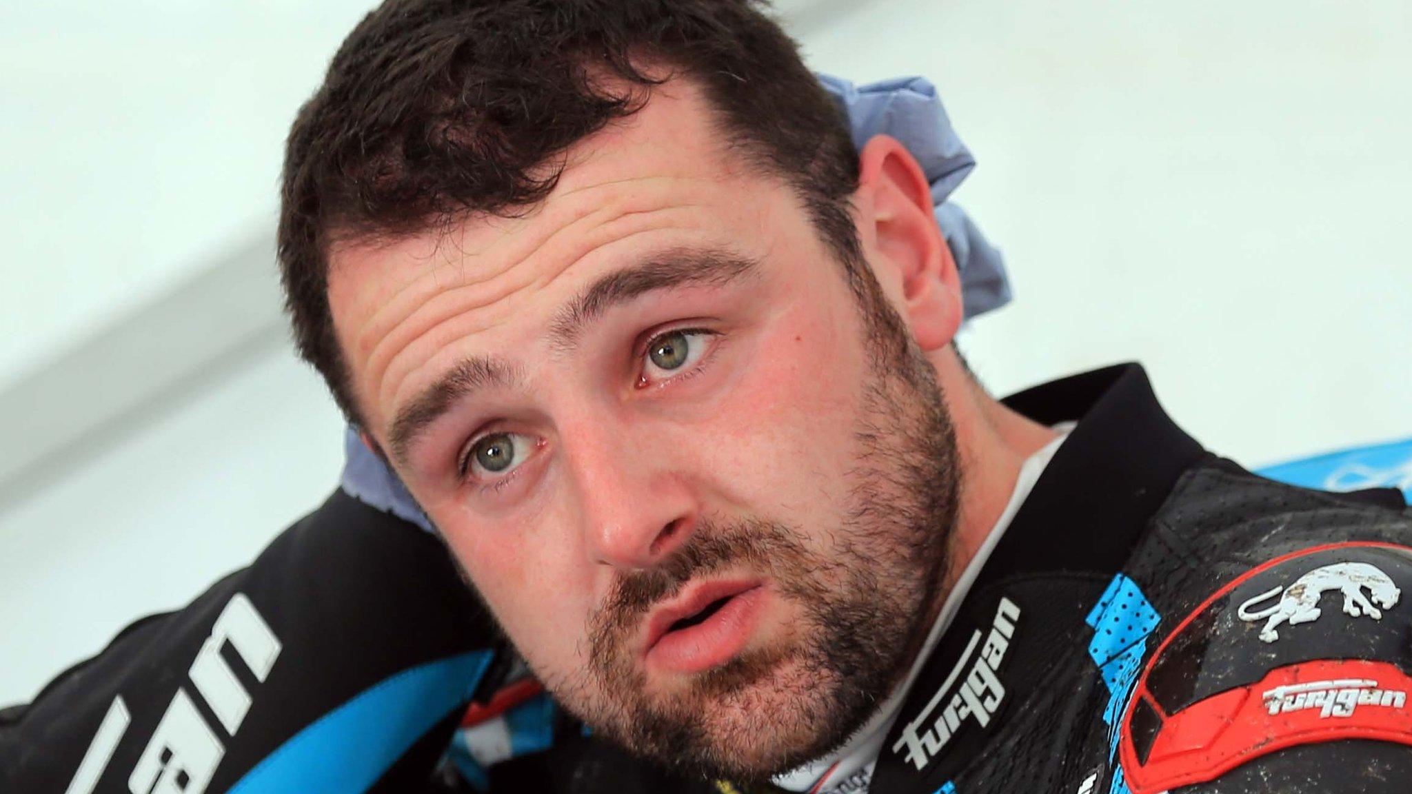 Michael Dunlop relaxes in the pits at the Isle of Man TT