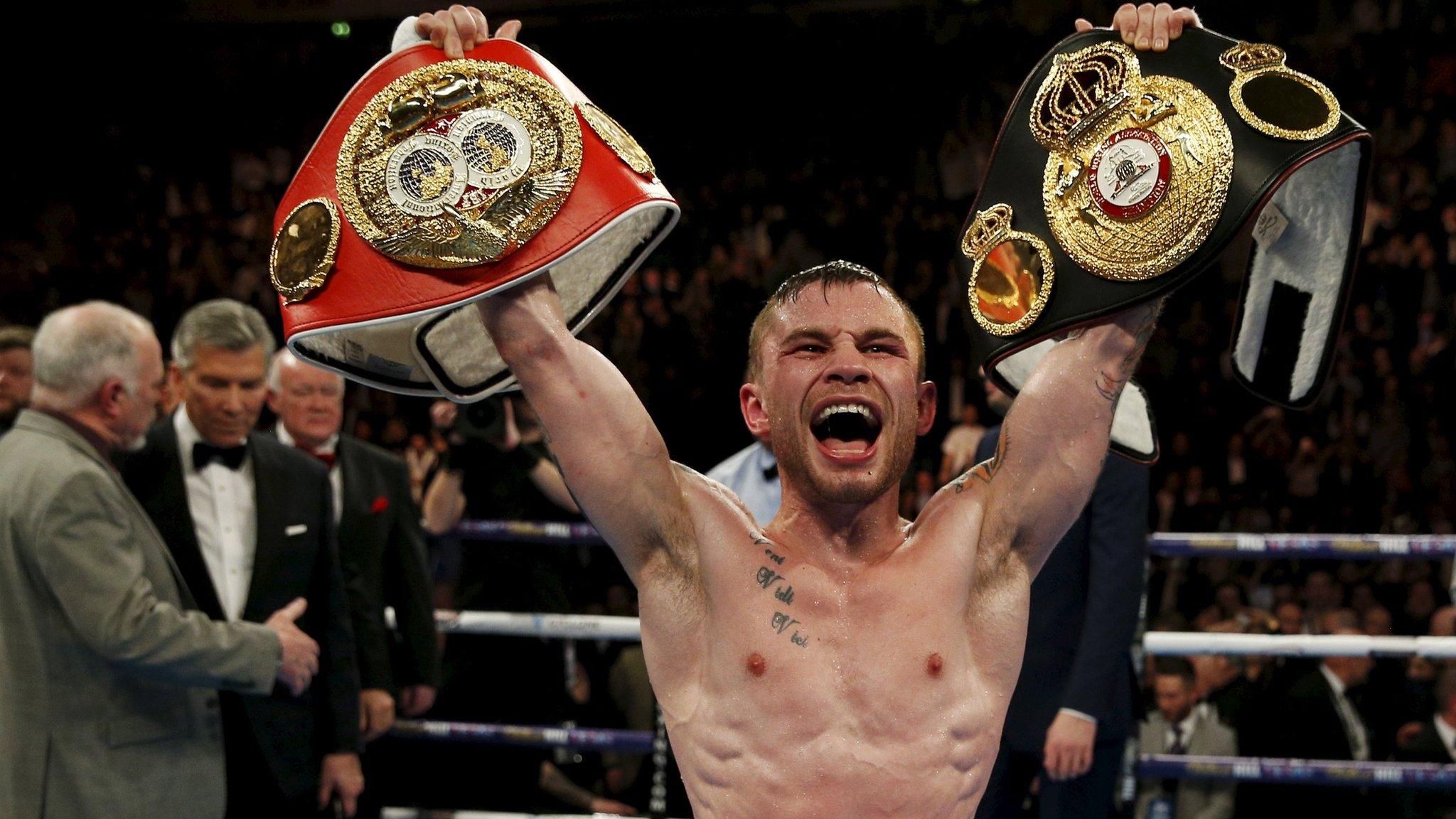 Carl Frampton with super-bantamweight belts