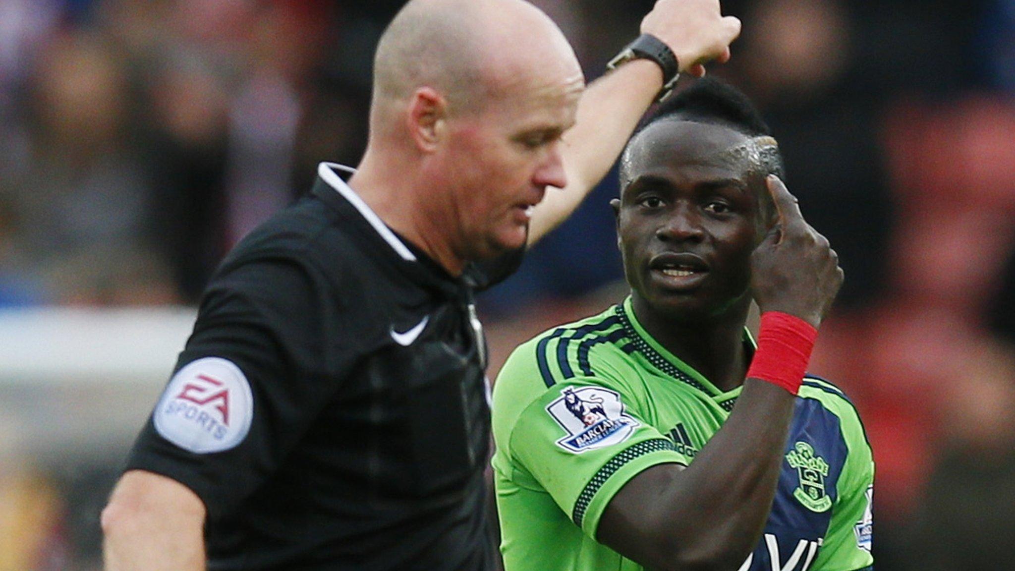 Sadio Mane is sent off by referee Lee Mason