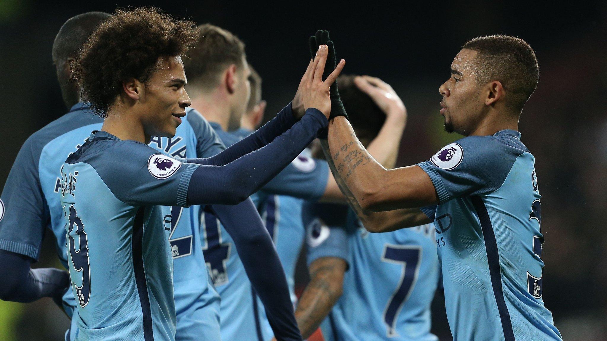 Gabriel Jesus and Leroy Sane celebrate