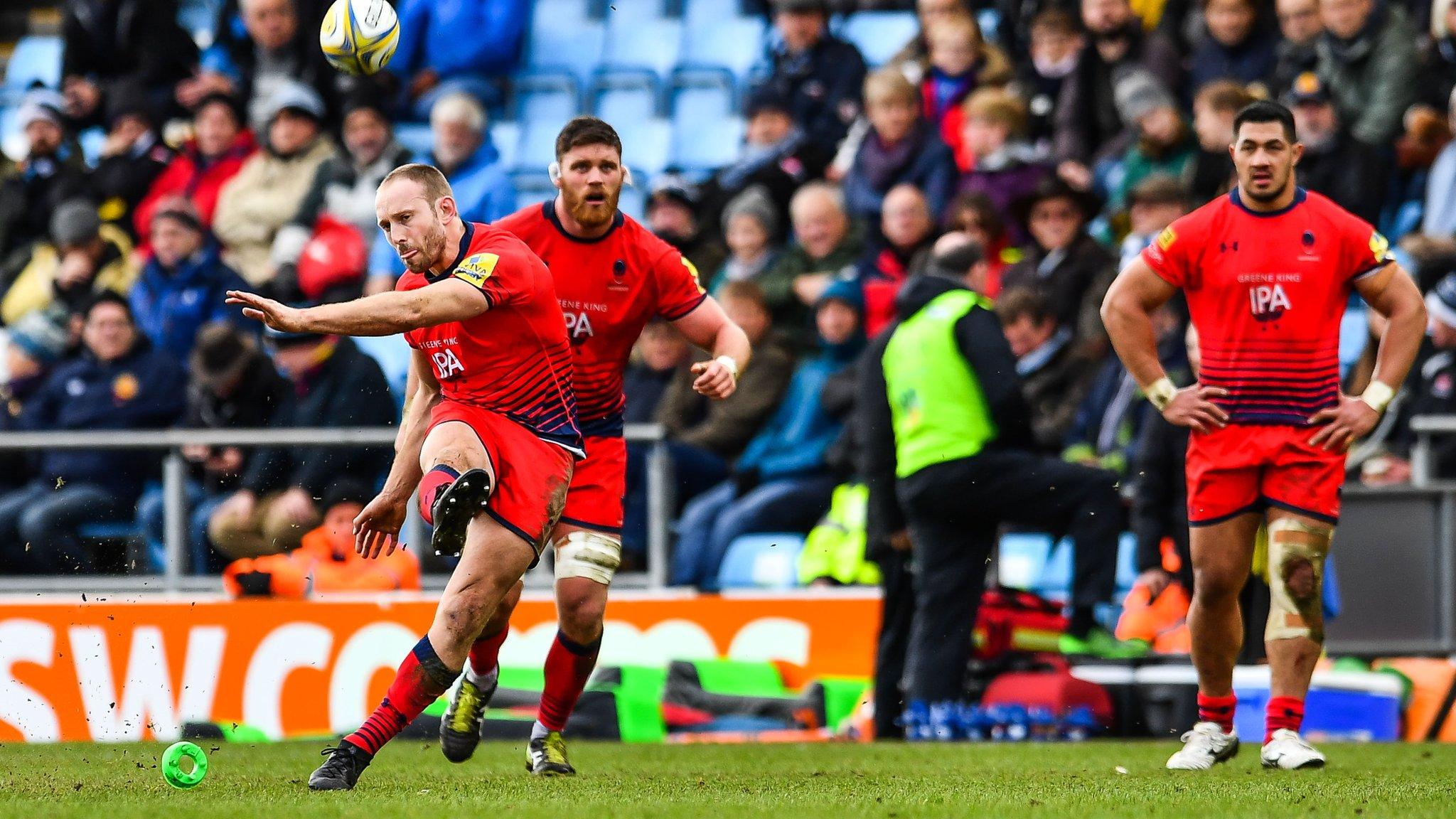 Chris Pennell kicks the ball towards the posts for a Worcester win