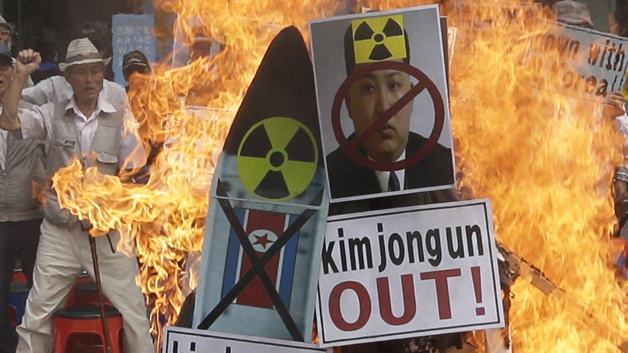 Image of North Korean leader Kim Jong-un is burned by South Korean protesters during rally denouncing North Korea's latest nuclear test in Seoul, South Korea. 10 Sept, 2016