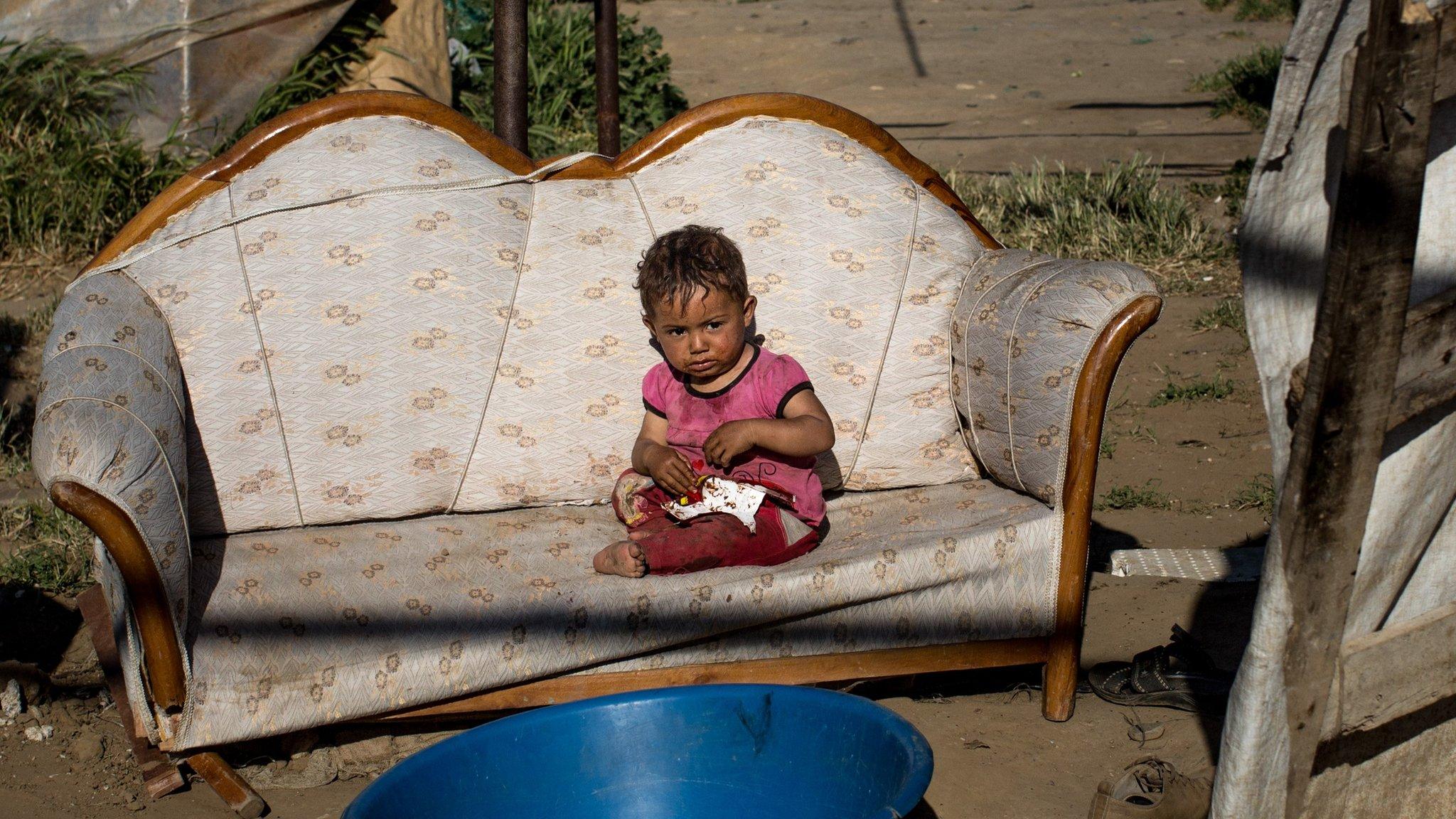 A Syrian child at a camp on the outskirts of Izmir, Turkey