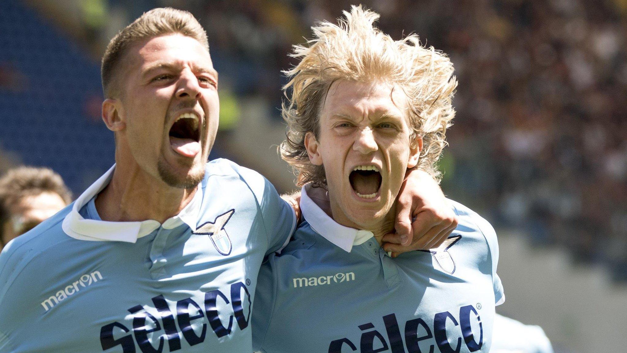 Lazio celebrate scoring against Roma