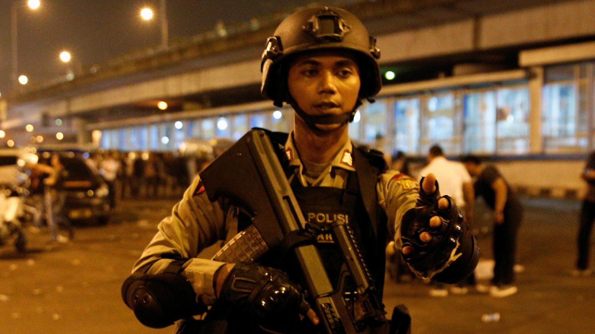 Police at the site of the explosion