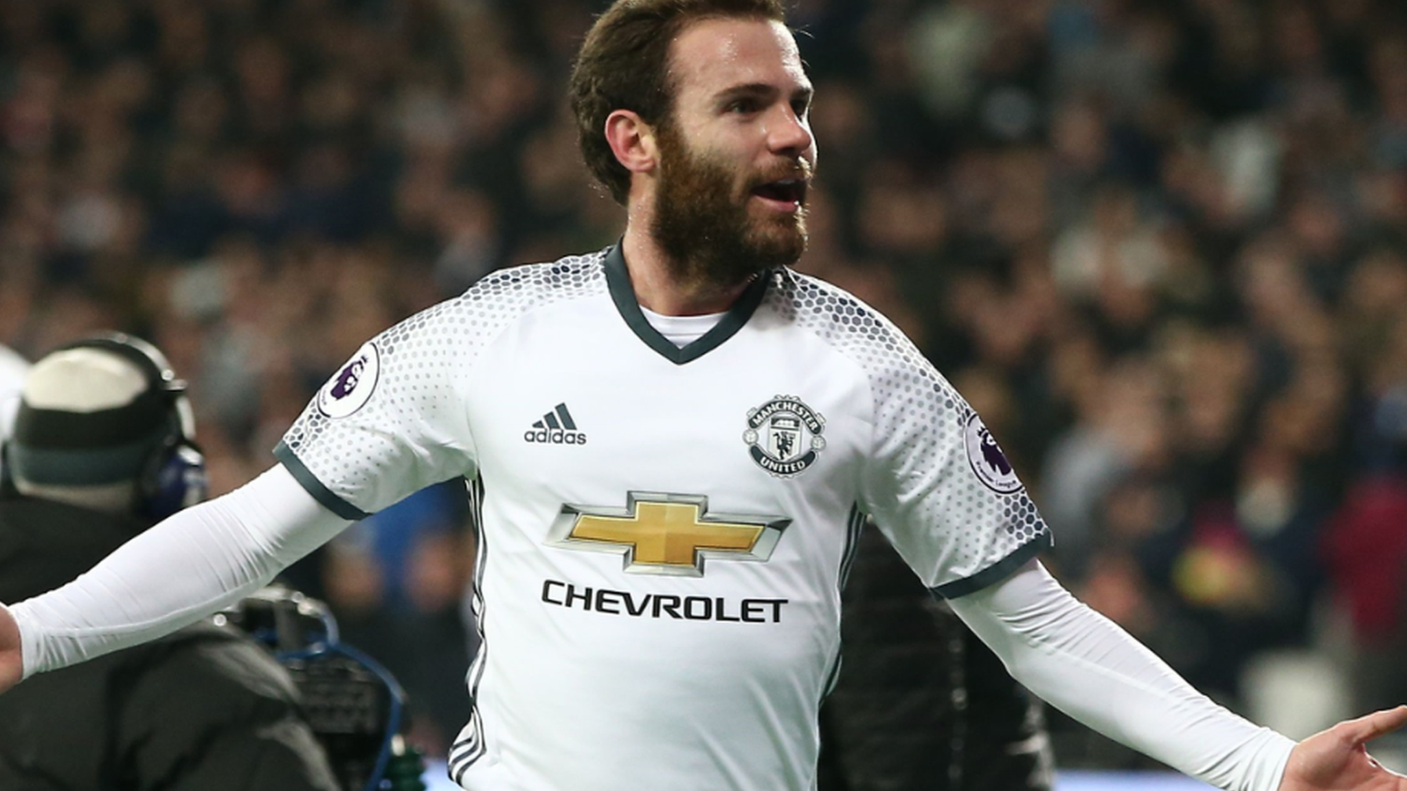 Substitute Juan Mata celebrates scoring for Manchester United against West Ham