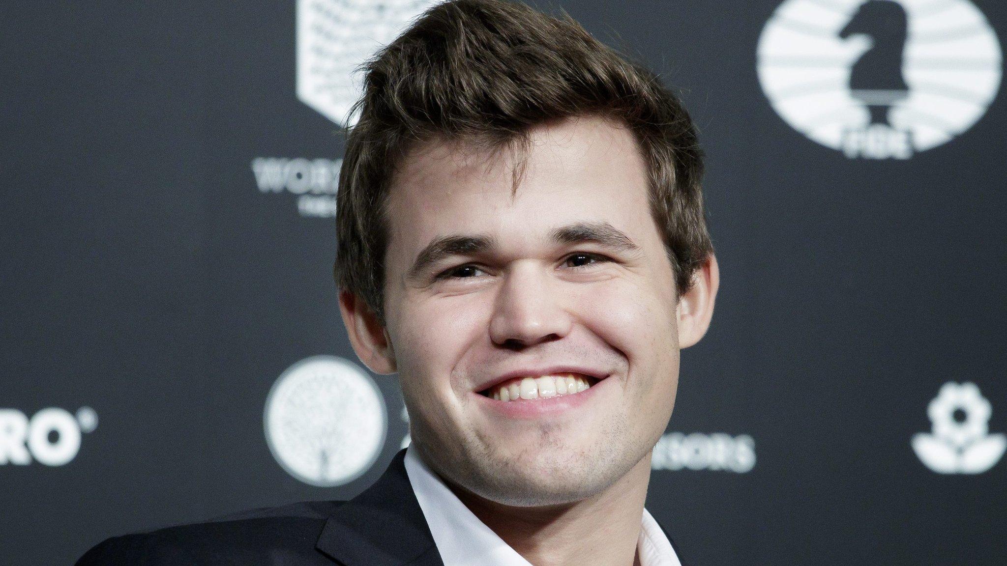 Chess player Magnus Carlsen of Norway smiles after defeating Sergey Karjakin of Russia. 30 Nov 2016