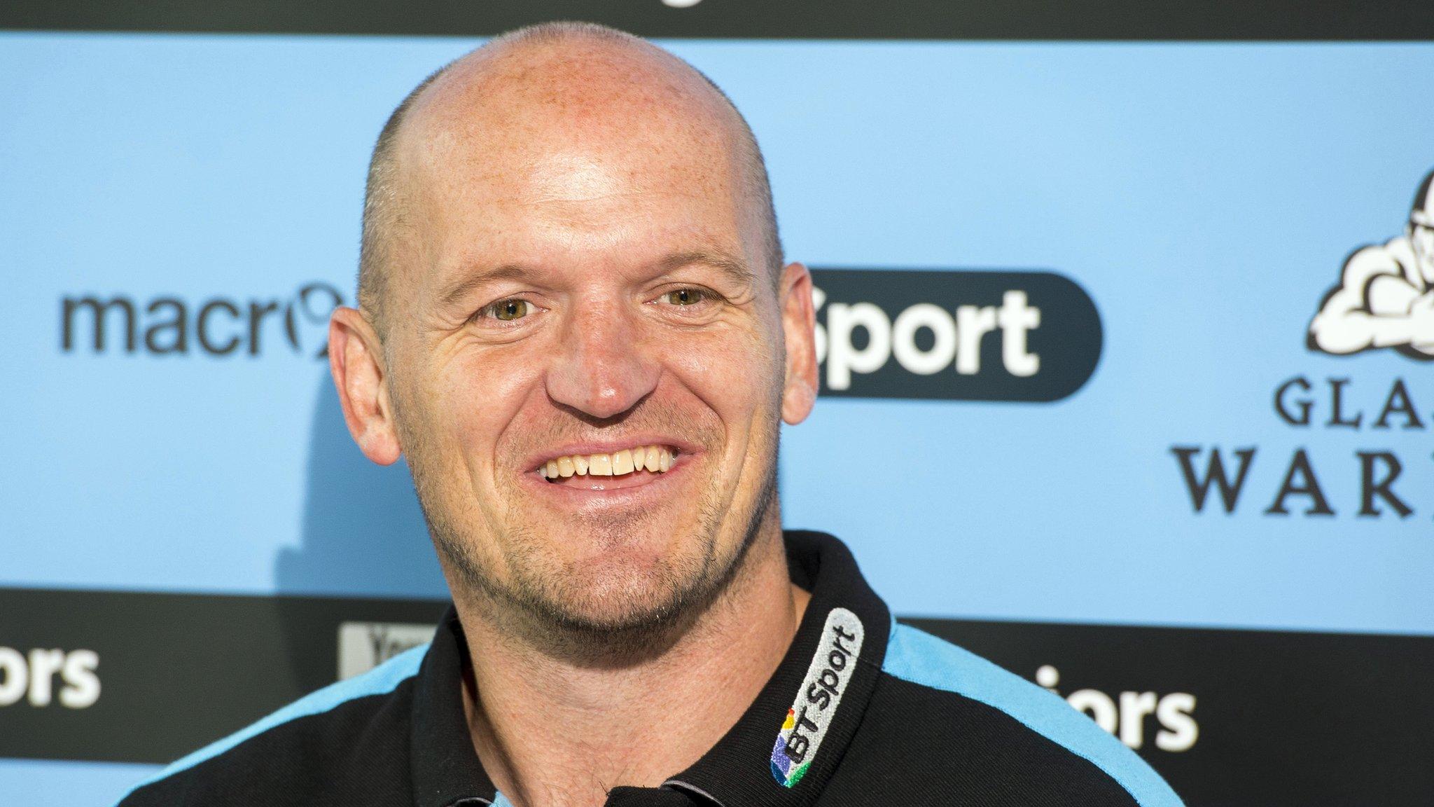 Gregor Townsend smiles as he speask to the media