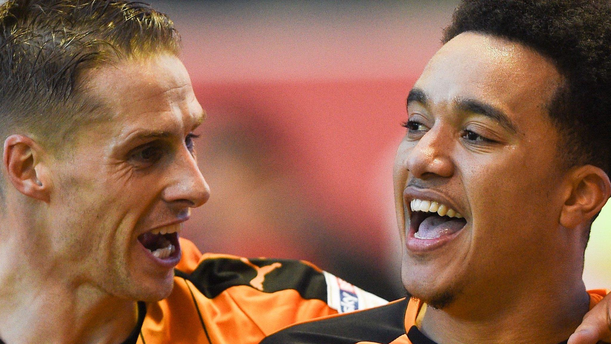 Helder Costa of Wolves (right) enjoys his goal against Nottingham Forest