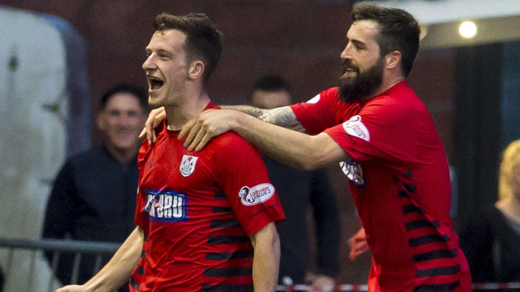 David Galt (left) of Queen's Park celebrates