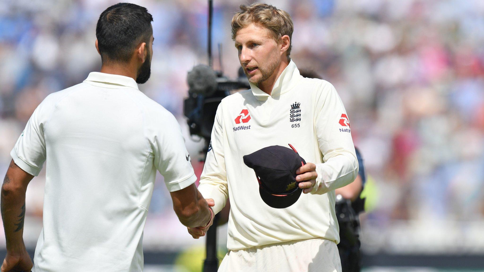 Joe Root and Virat Kohli shake hands