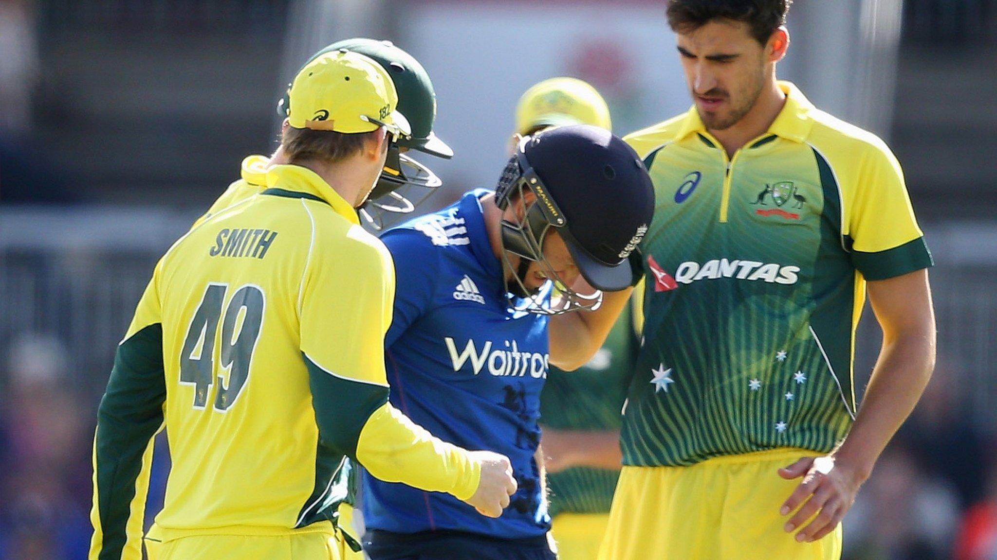 Australia's fielders show concern after Eoin Morgan is hit