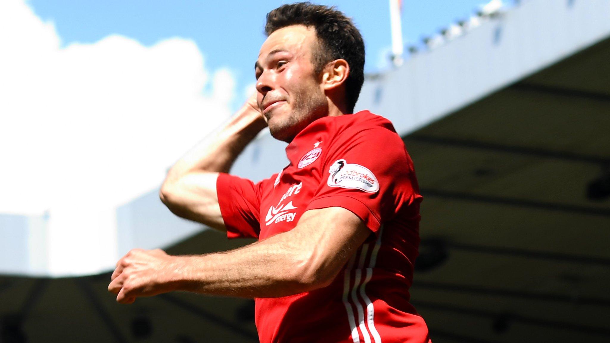 Andrew Considine celebrates