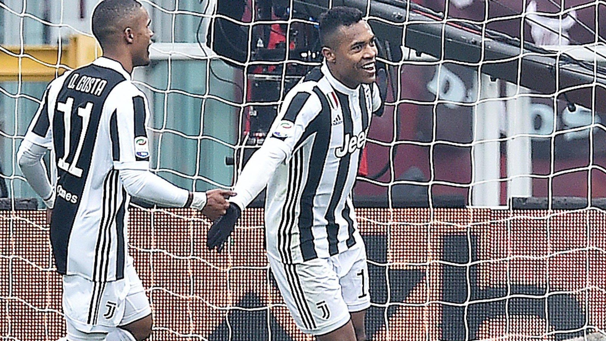 Alex Sandro celebrates scoring the winning goal for Juventus