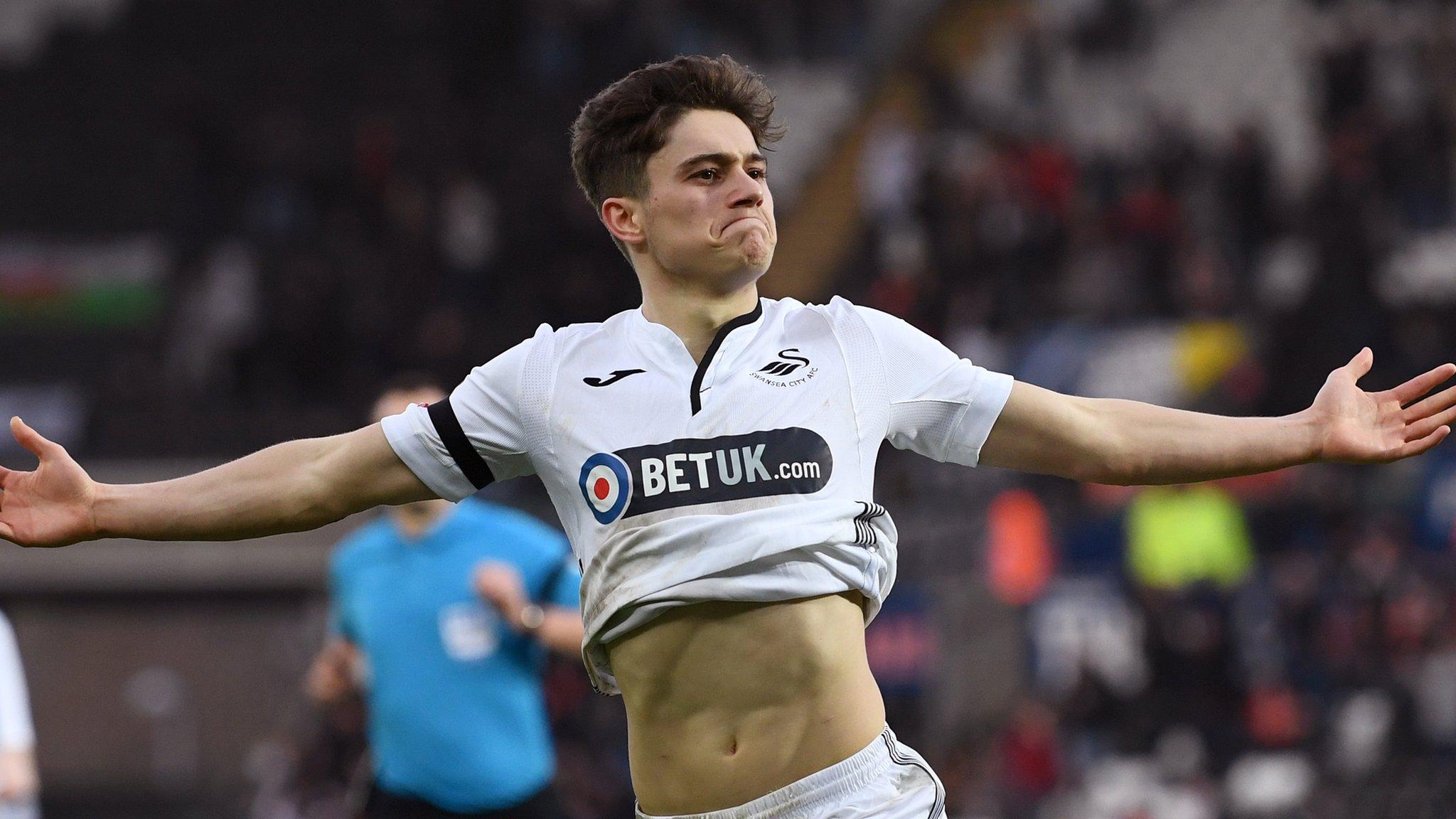 Daniel James celebrates