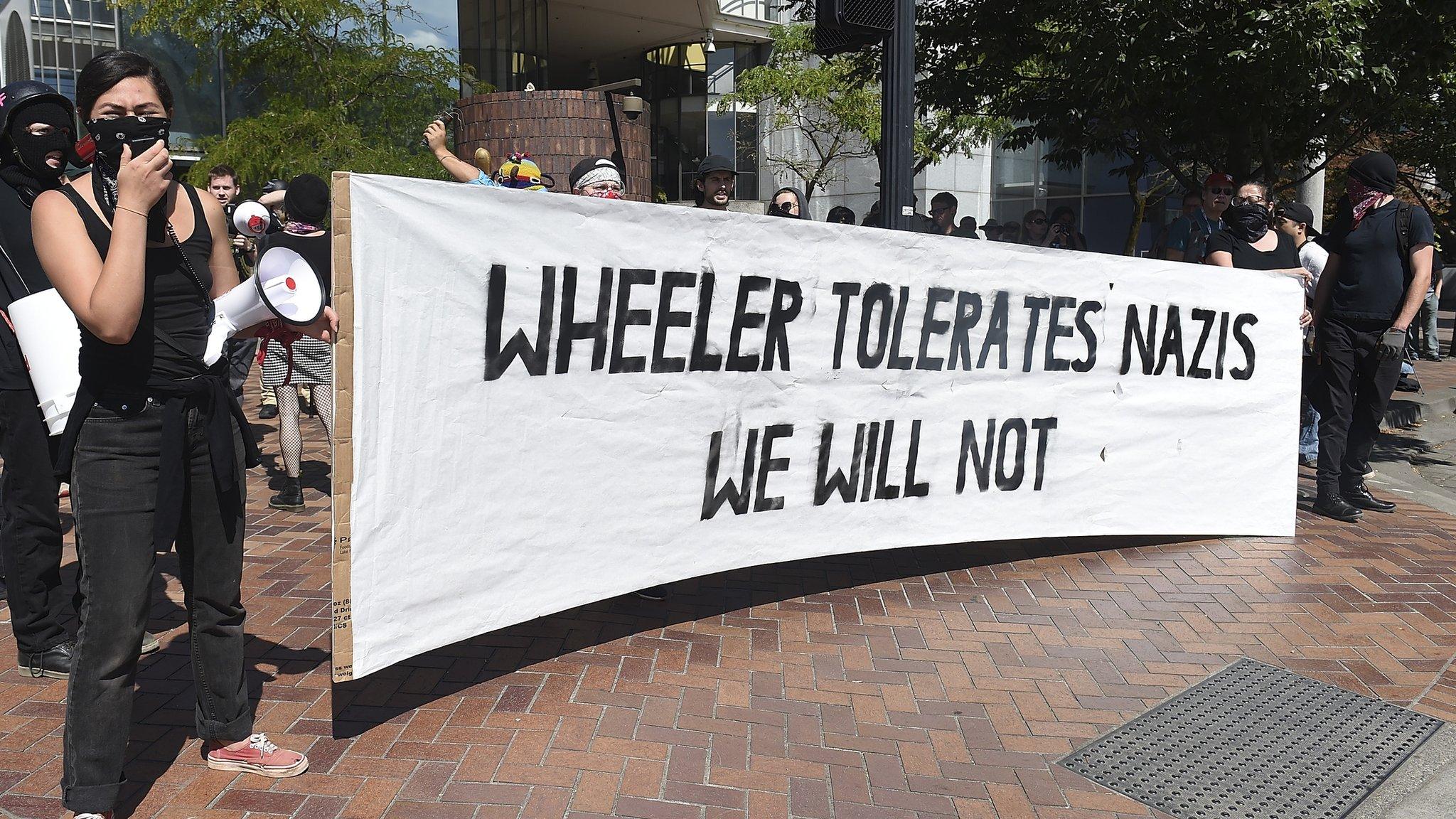 banner: wheeler tolerates Nazis, we will not