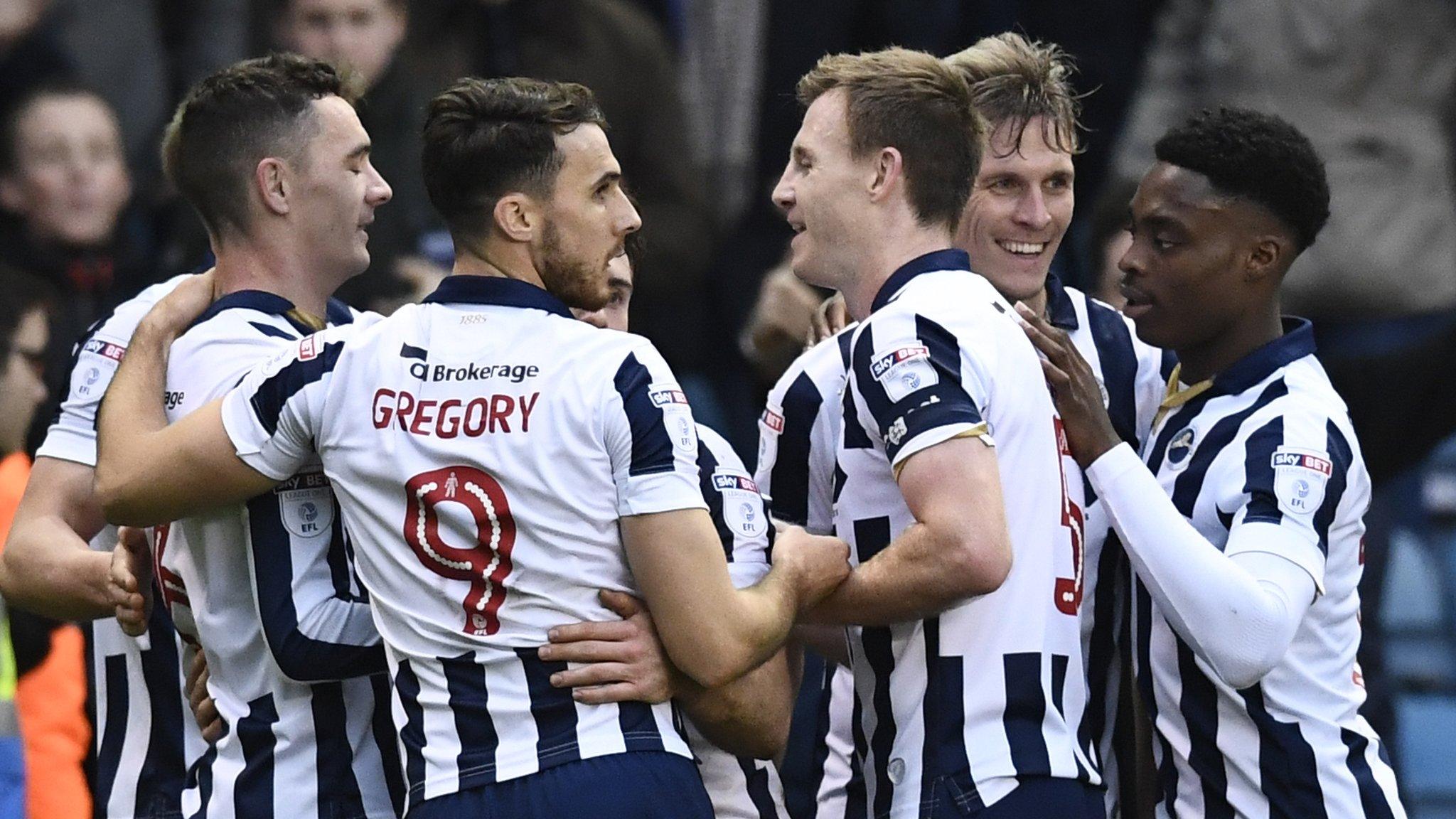 Millwall players celebrate Steve Morison's goal