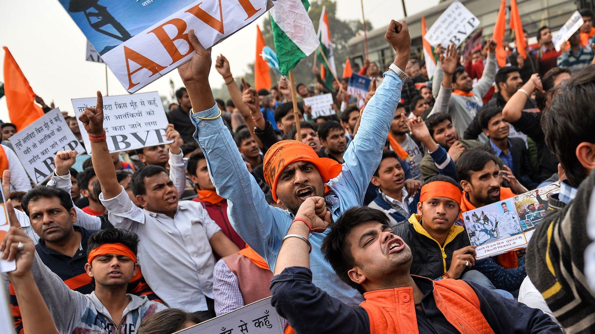 Indian demonstrators shout slogans during a rally against the Jawaharlal Nehru University Students Union (JNUSU) in New Delhi on February 12, 2016