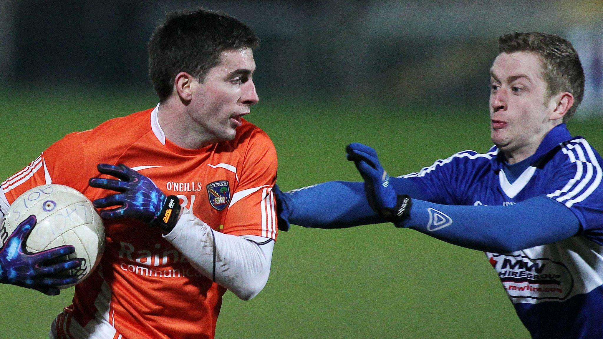 Armagh's Andy Mallon and Laois player Paul Kingston