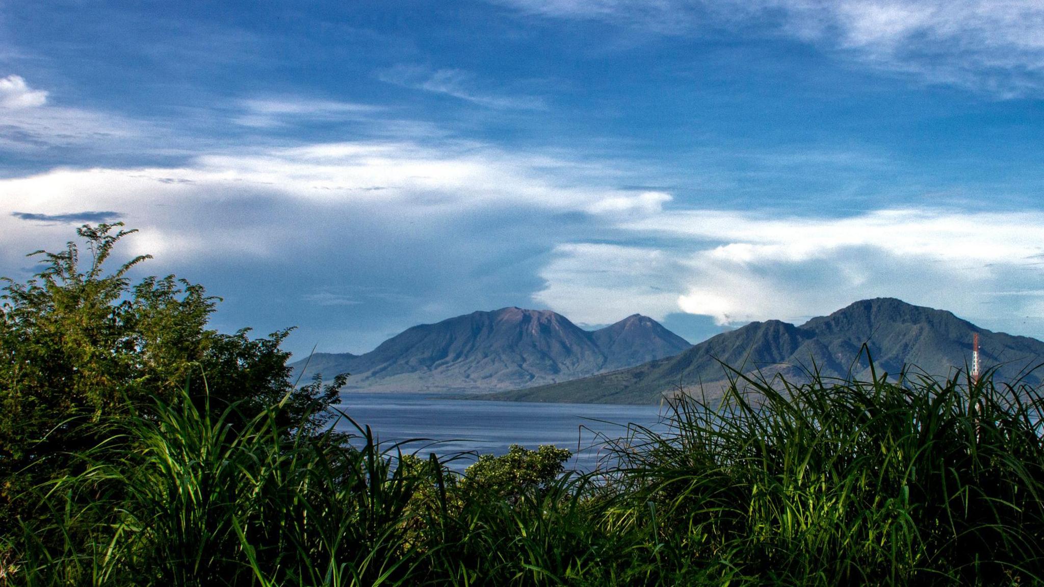 A photo of Mount Lewotobi Laki-laki and the surrounding area.