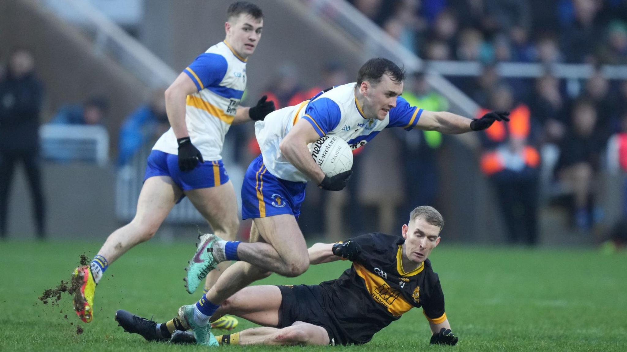 Darragh Canavan is in possession at Newbridge as brother Ruairi is close by