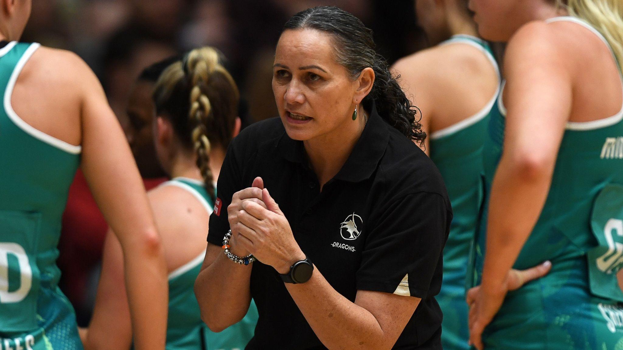 Head coach Reigna Bloxham talks to Dragons players