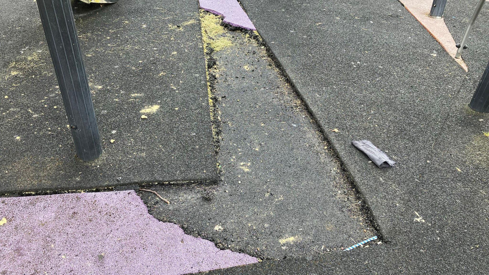 Damaged surface at the play park