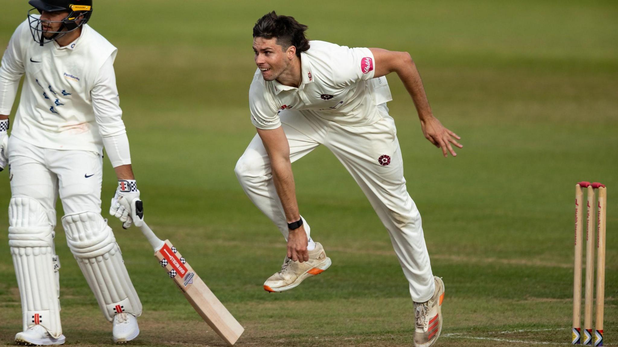 A photo of Justin Broad in action during Northamptonshire's match against Surrey in June