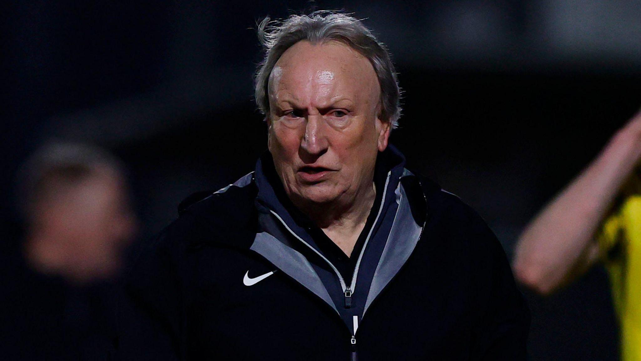 Neil Warnock looks on