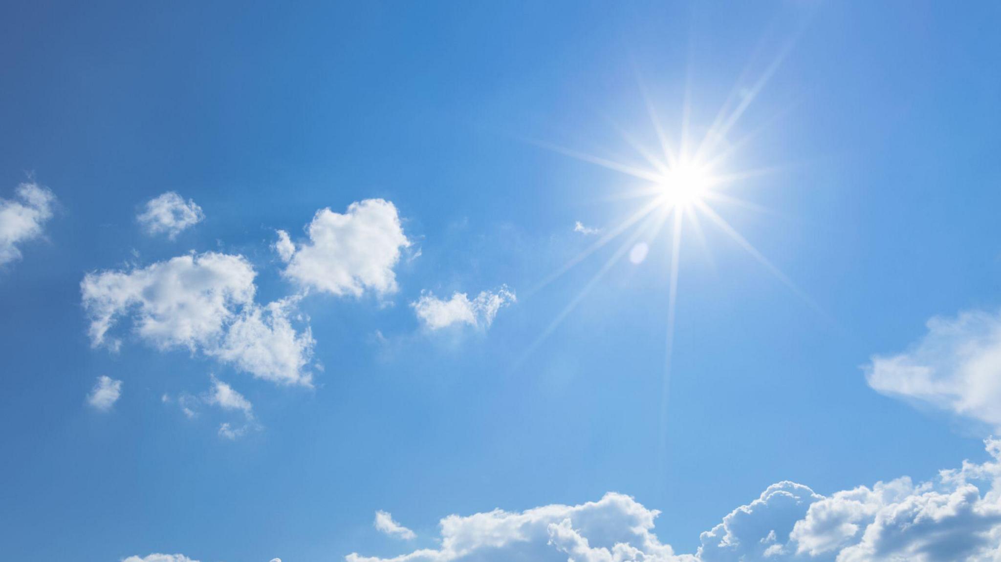 Blue sky with sun.