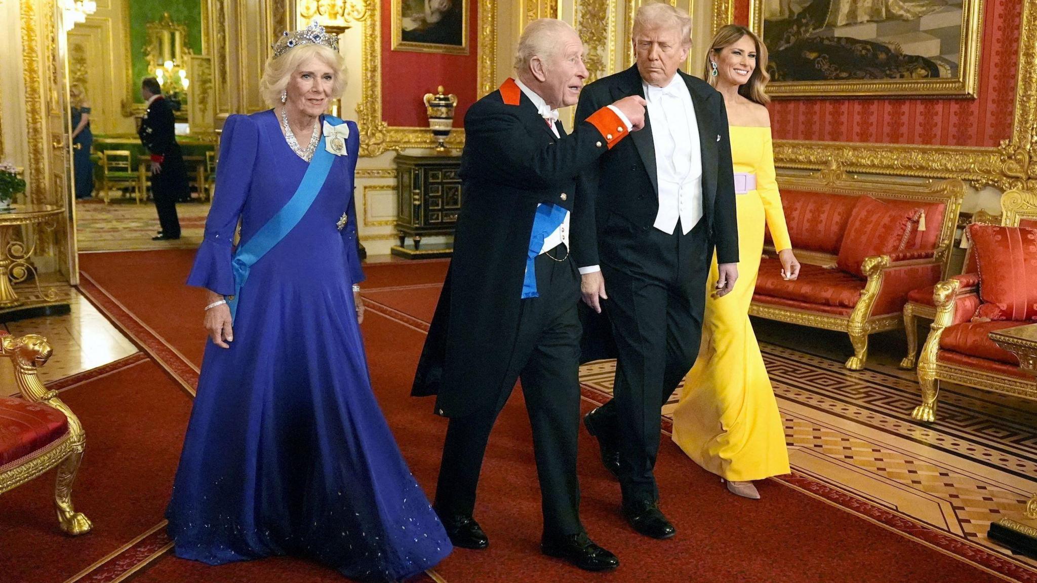 The Trumps on their way to the banquet with the King and Queen