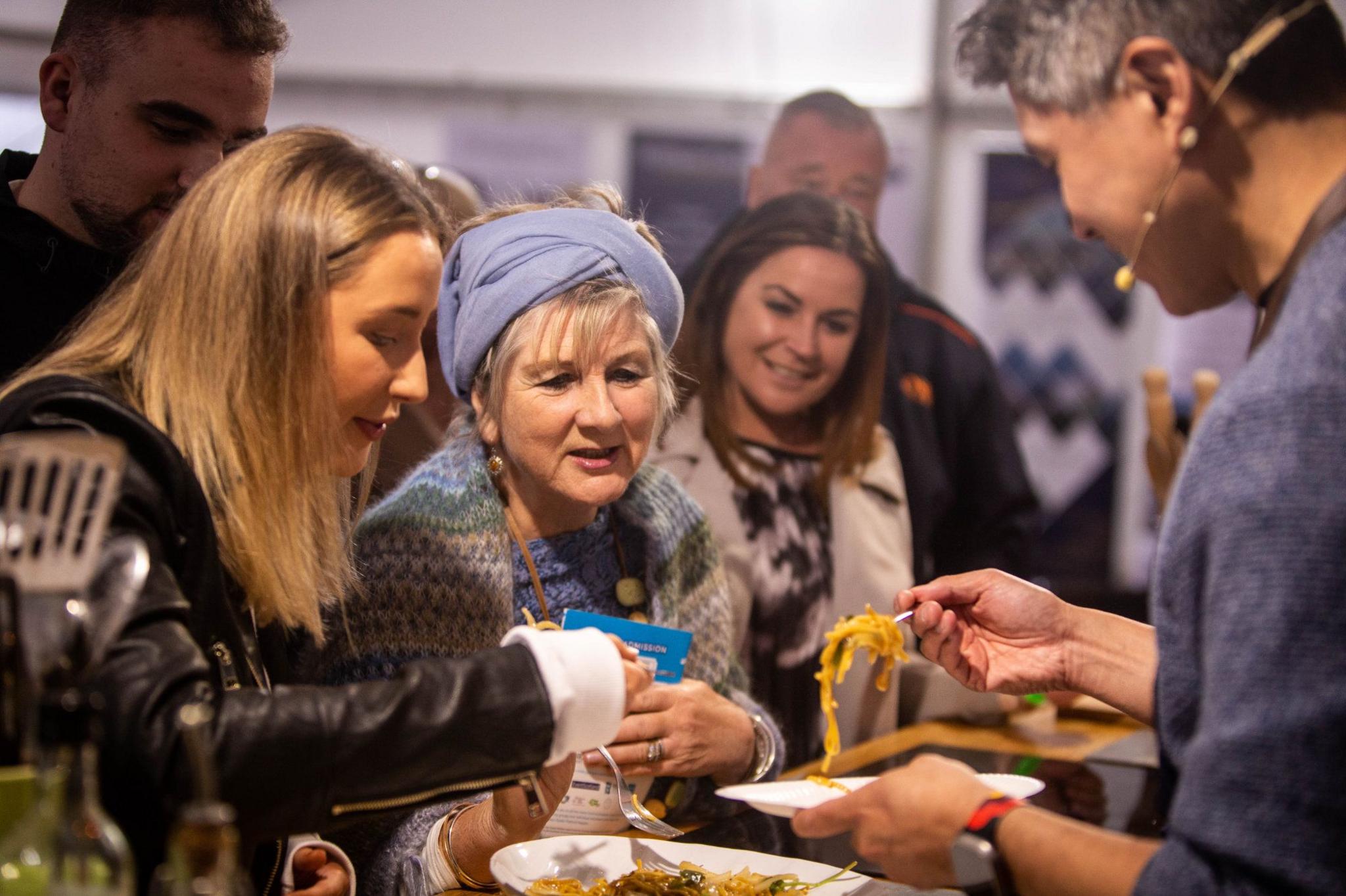 Festival goers sampling the food on offer