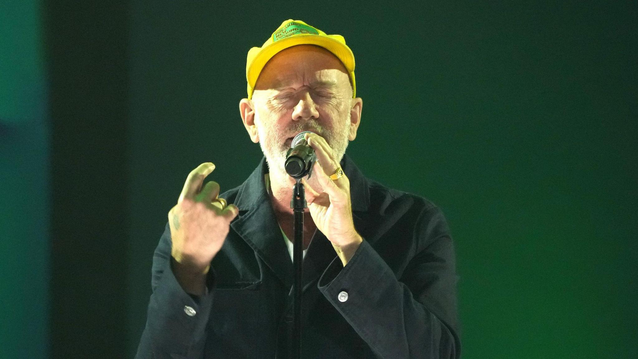 Michael Stipe of REM sings as the band are inducted into the Songwriters Hall Of Fame