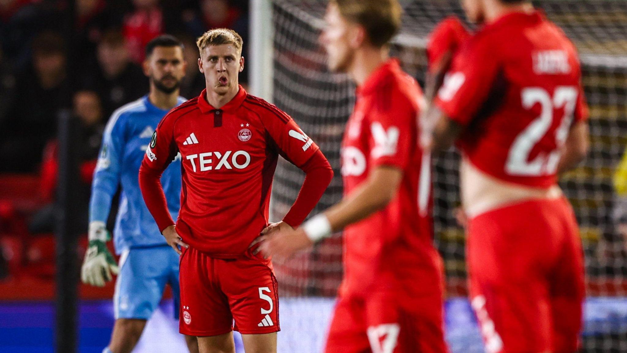 Aberdeen's Mats Knoester looks dejected after Shakhtar Donetsk's Pedro Henrique scores to make it 3-1 