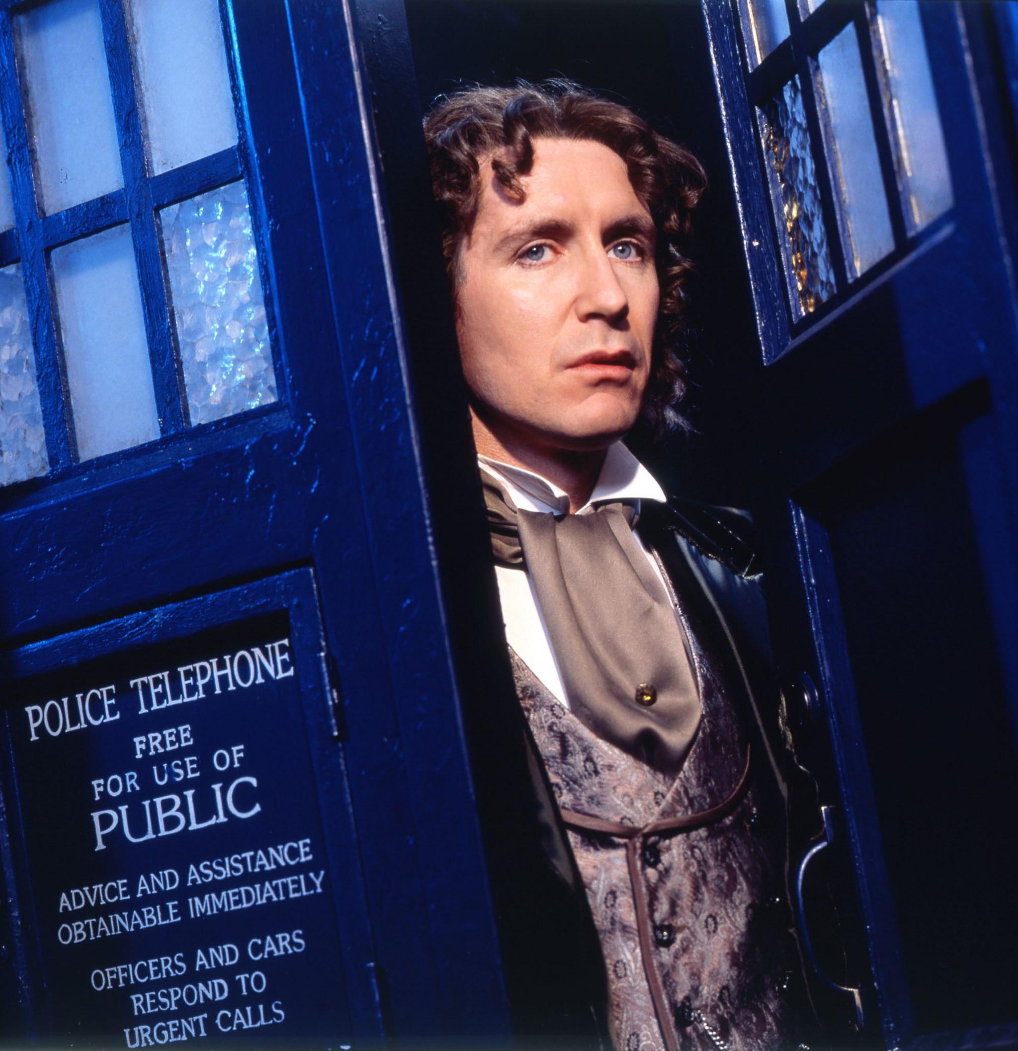 Paul McGann (The Eighth Doctor) emerging from the TARDIS. After a seven-year absence The Doctor made a return to the screen in Doctor Who: The Movie (1996)